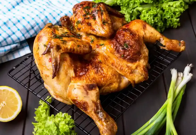 Poulet entier à la braise